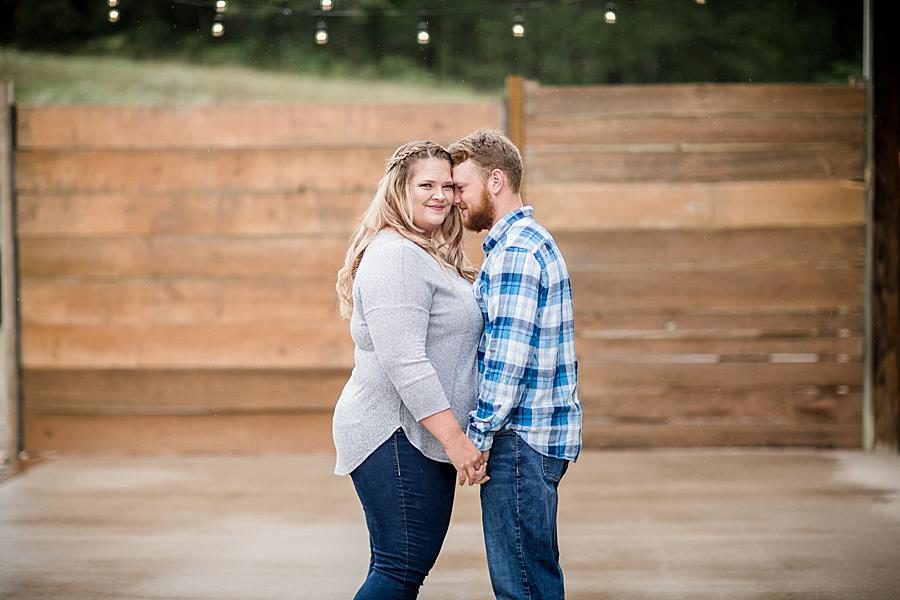 Wooden plank wall at this The Stables at Strawberry Creek Engagement Session by Knoxville Wedding Photographer, Amanda May Photos.