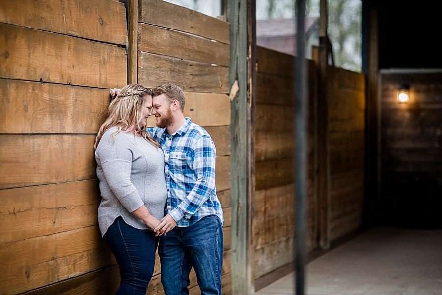 Foreheads together at this The Stables at Strawberry Creek Engagement Session by Knoxville Wedding Photographer, Amanda May Photos.