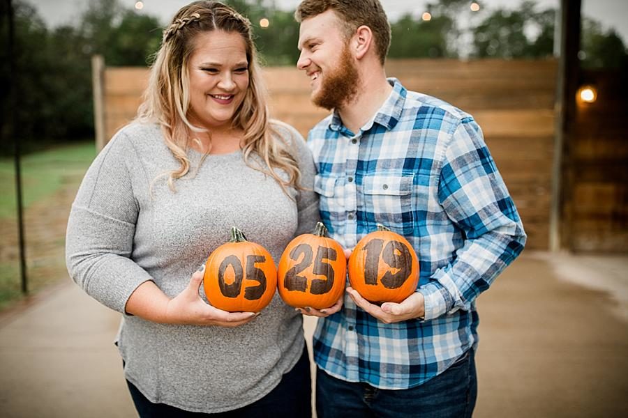 Wedding date on pumpkins at this The Stables at Strawberry Creek Engagement Session by Knoxville Wedding Photographer, Amanda May Photos.