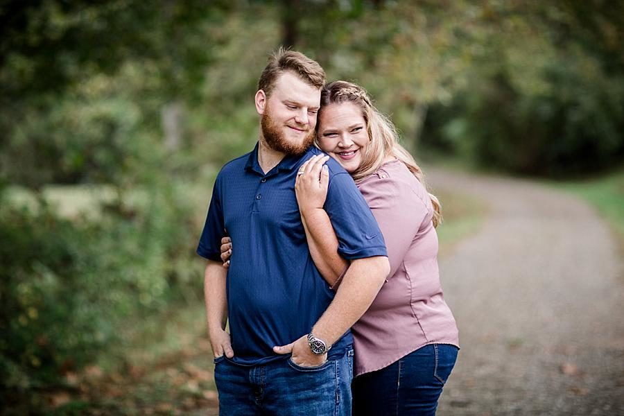 Hug from behind at this The Stables at Strawberry Creek Engagement Session by Knoxville Wedding Photographer, Amanda May Photos.