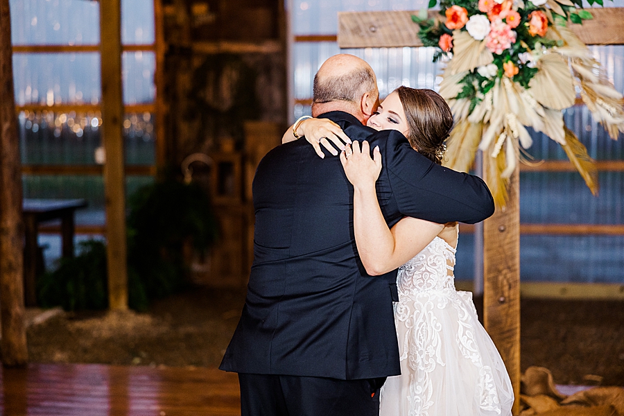 bride hugging dad