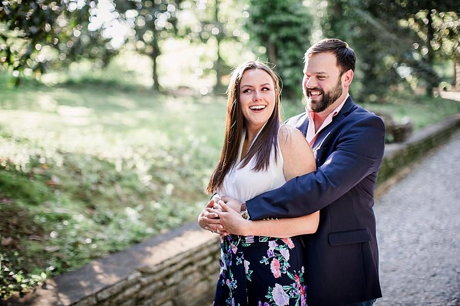 Laughing together at this Knoxville Botanical Engagement session by Knoxville Wedding Photographer, Amanda May Photos.