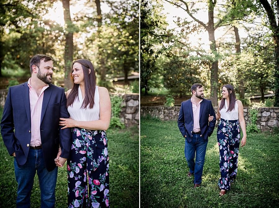 Walking in a field at this Knoxville Botanical Engagement session by Knoxville Wedding Photographer, Amanda May Photos.