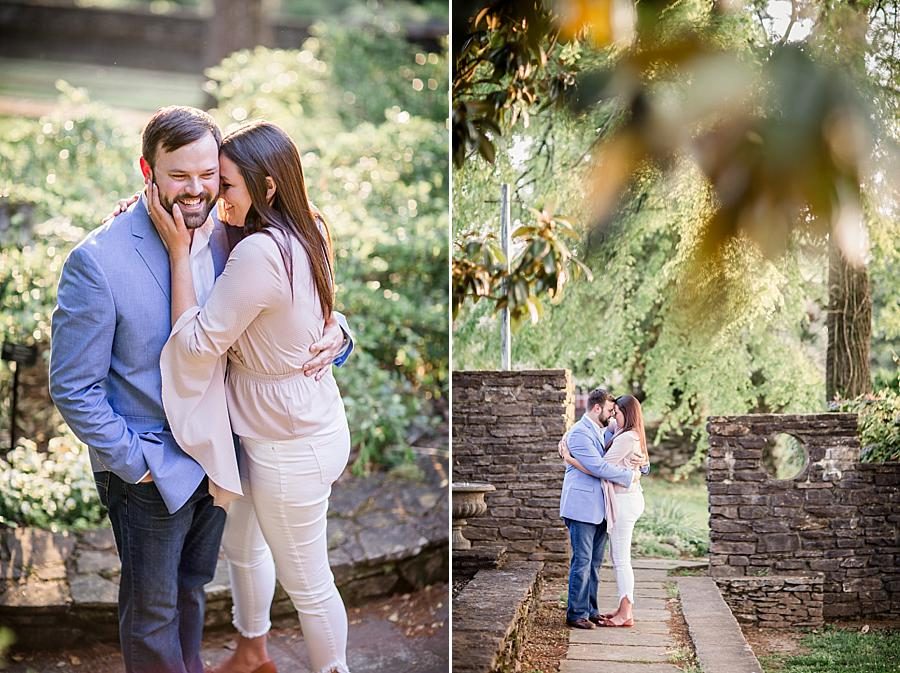 She cuddles his face at this Knoxville Botanical Engagement session by Knoxville Wedding Photographer, Amanda May Photos.