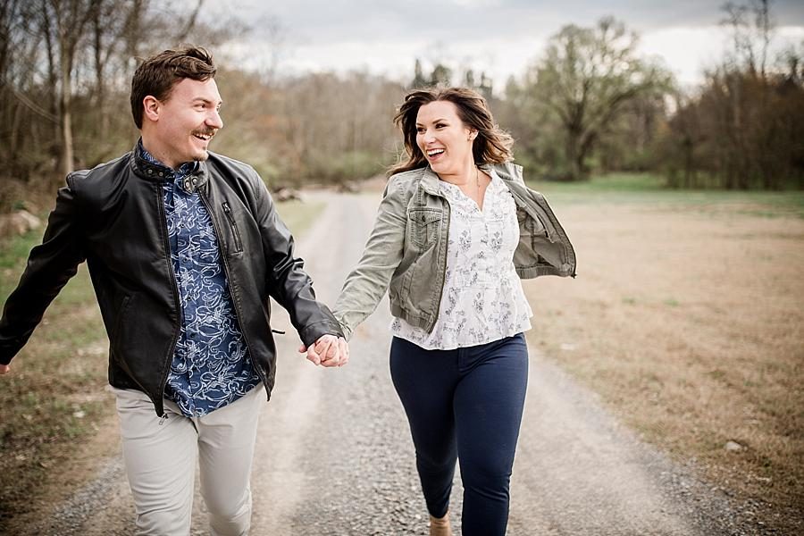 Running at the camera at this Knoxville engagement session at The Quarry by Knoxville Wedding Photographer, Amanda May Photos.
