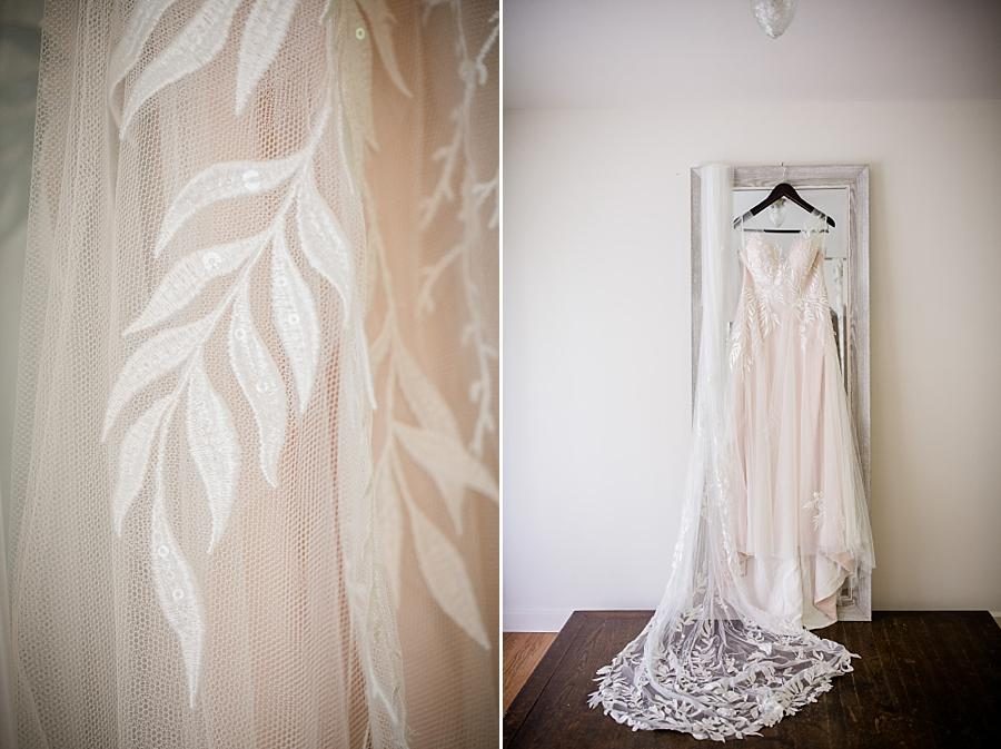 Hanging wedding dress at this The Quarry wedding by Knoxville Wedding Photographer, Amanda May Photos.
