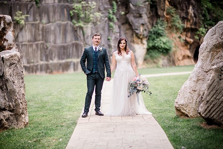 Holding hands at this The Quarry wedding by Knoxville Wedding Photographer, Amanda May Photos.