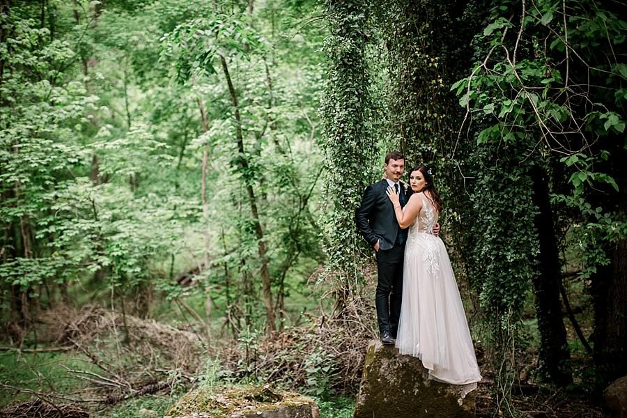 Standing on a rock at this The Quarry wedding by Knoxville Wedding Photographer, Amanda May Photos.
