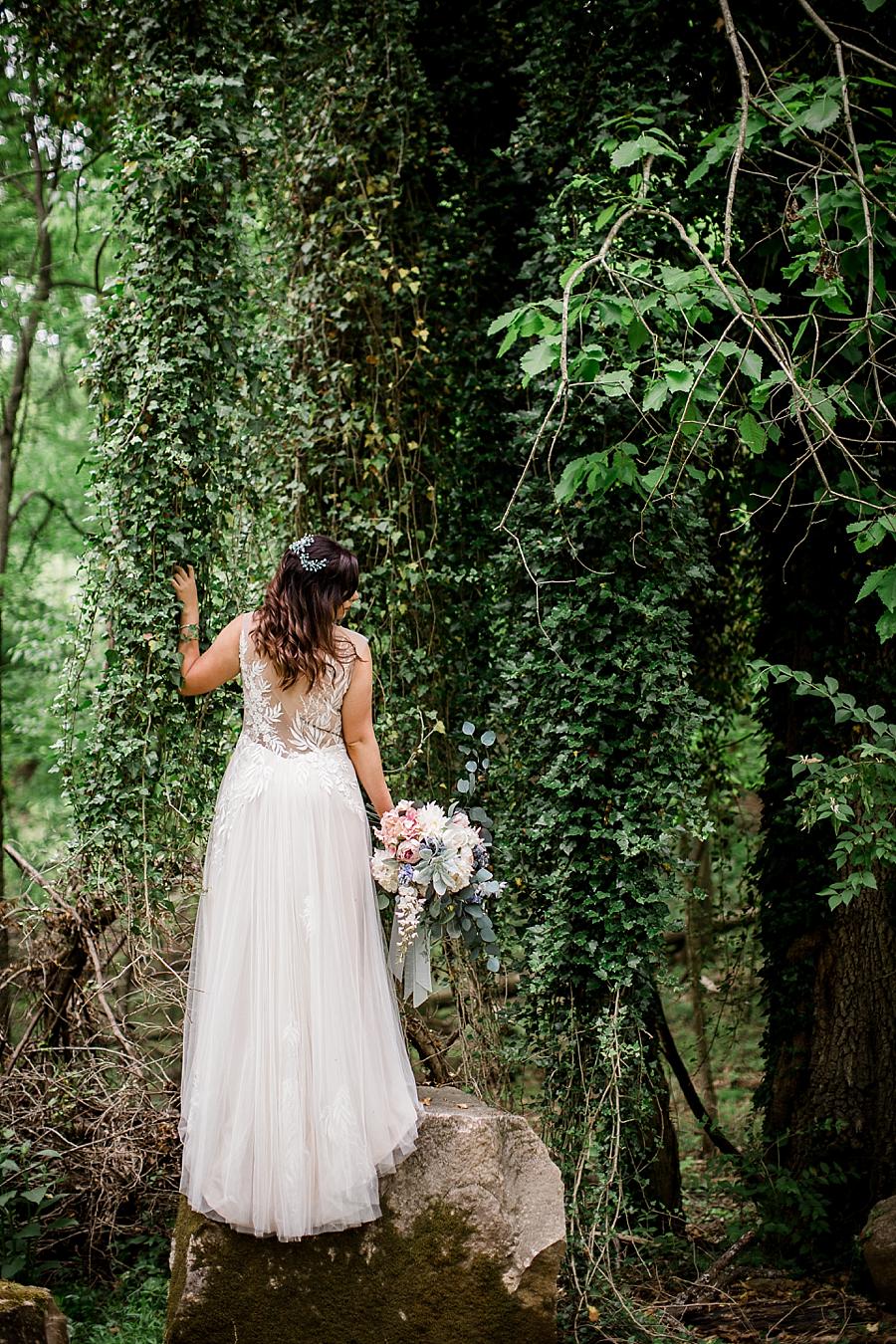 Bride holding onto ivy at this The Quarry wedding by Knoxville Wedding Photographer, Amanda May Photos.