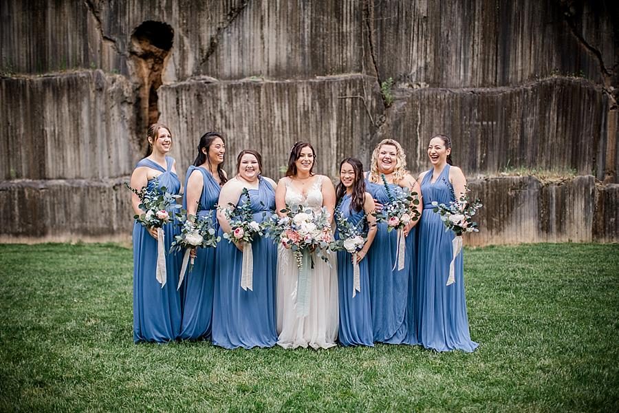 Bride and bridesmaids in the quarry at this The Quarry wedding by Knoxville Wedding Photographer, Amanda May Photos.