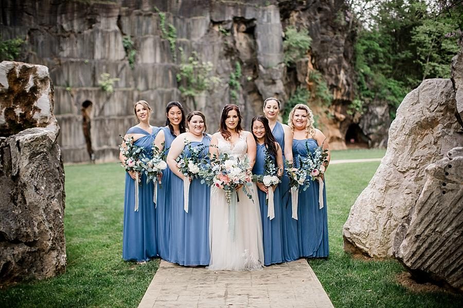Between two rocks at this The Quarry wedding by Knoxville Wedding Photographer, Amanda May Photos.