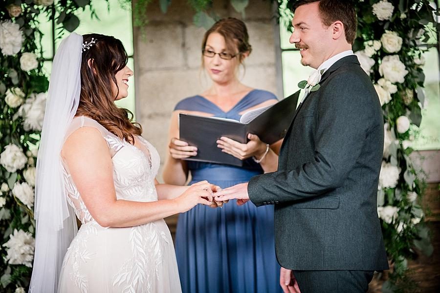 Exchanging rings at this The Quarry wedding by Knoxville Wedding Photographer, Amanda May Photos.