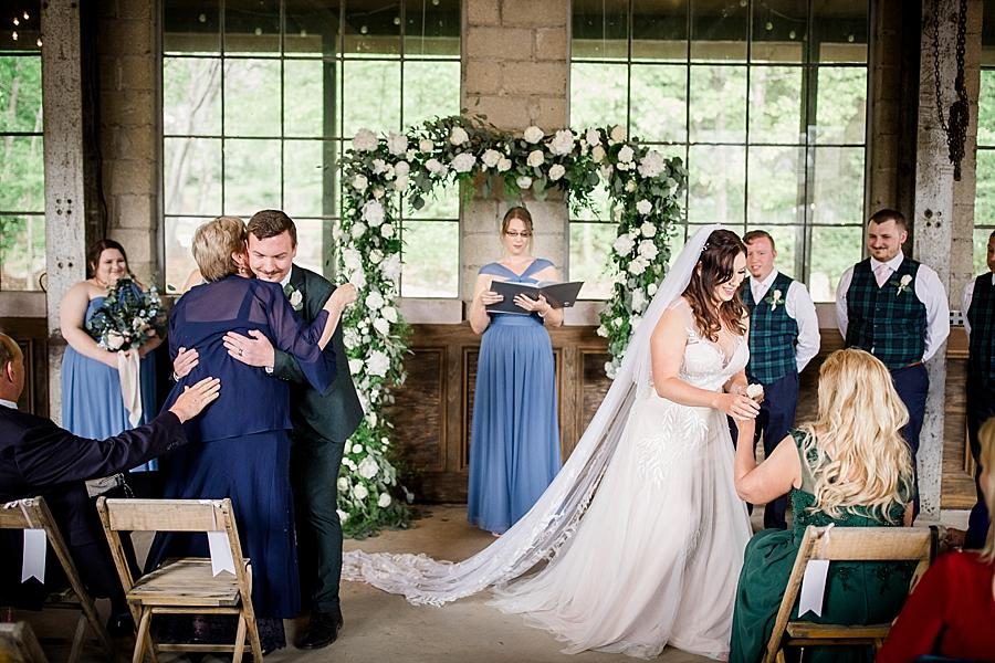 Couple hugging their parents at this The Quarry wedding by Knoxville Wedding Photographer, Amanda May Photos.