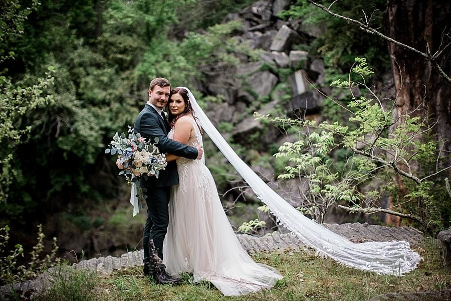 Arms wrapped around each other at this The Quarry wedding by Knoxville Wedding Photographer, Amanda May Photos.