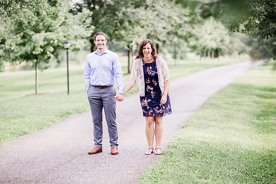 Holding hands at this engagement at Castleton Farms by Knoxville Wedding Photographer, Amanda May Photos