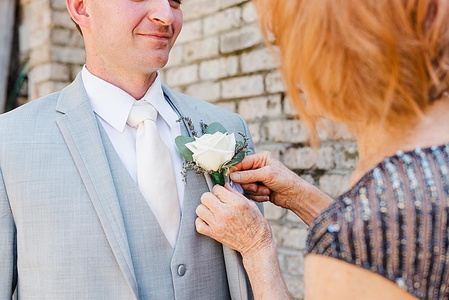 pinning the boutonniere at castleton