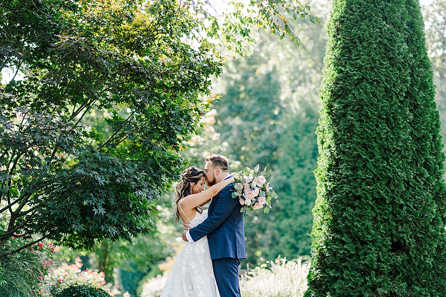 kiss on the forehead at this castleton farms wedding