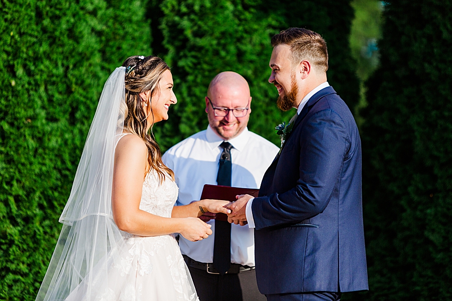 exchanging rings at this castleton farms wedding