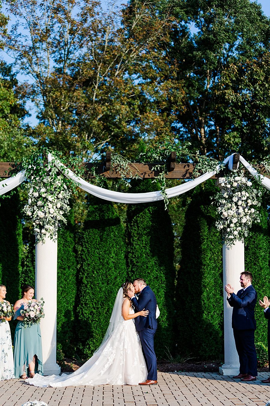 you may kiss the bride at this castleton farms wedding