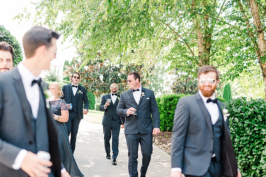 groomsmen walking at castleton wedding