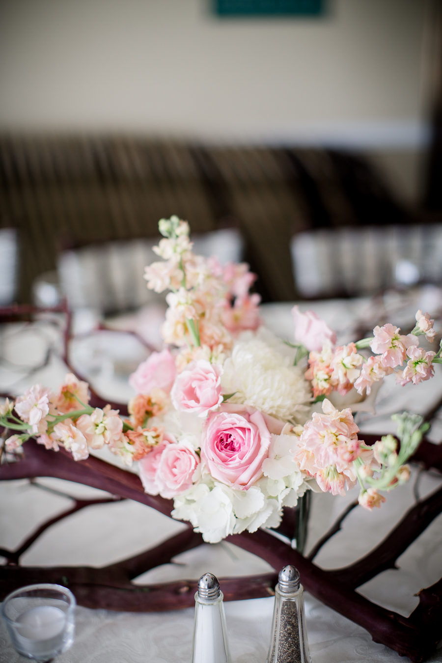 Close up detail shot of flowers on table at this Daytona Beach Wedding by Destination Wedding Photographer, Amanda May Photos.