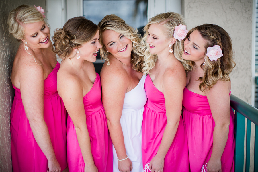 Bride with bridesmaids at this Daytona Beach Wedding by Destination Wedding Photographer, Amanda May Photos.