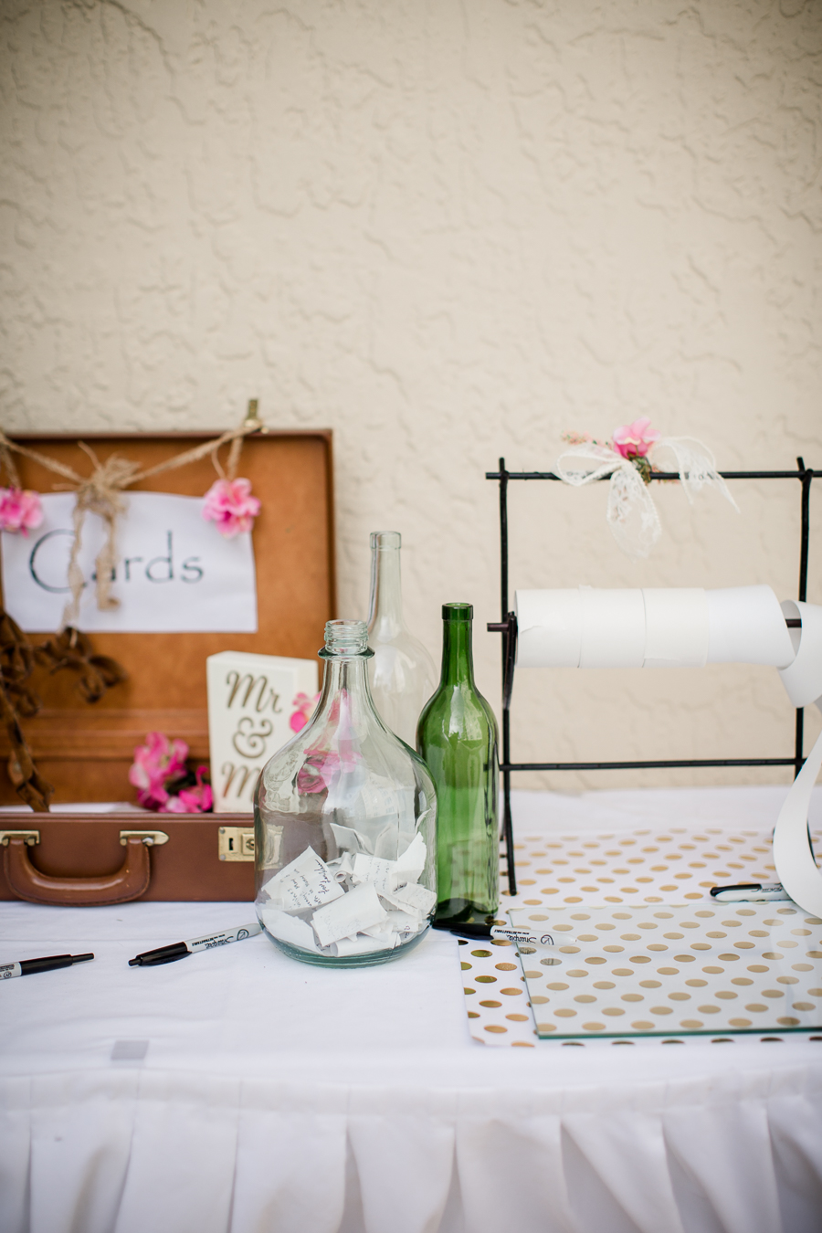 Message in a bottle table at this Daytona Beach Wedding by Destination Wedding Photographer, Amanda May Photos.