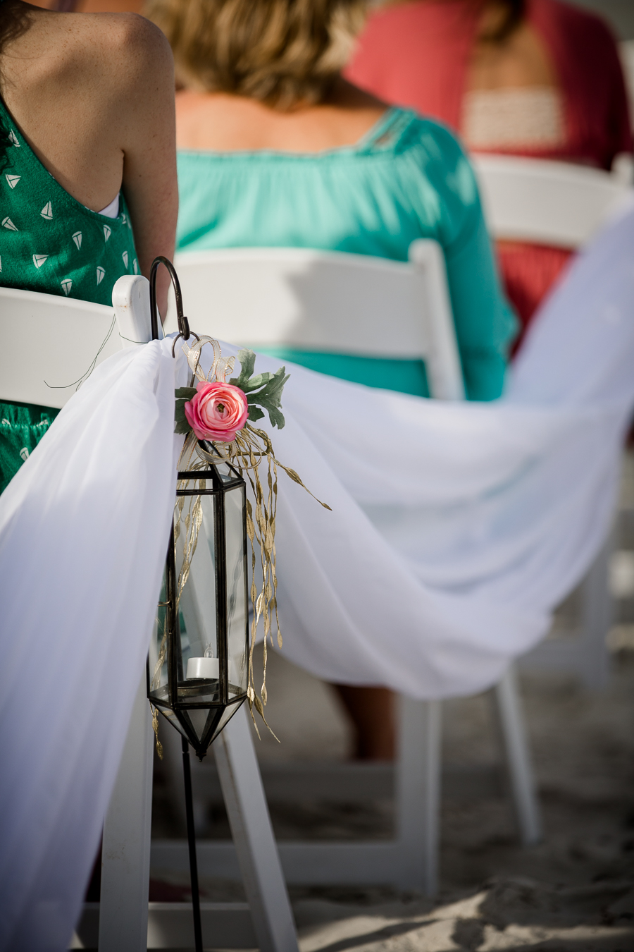 Flower arrangement on asile at this Daytona Beach Wedding by Destination Wedding Photographer, Amanda May Photos.