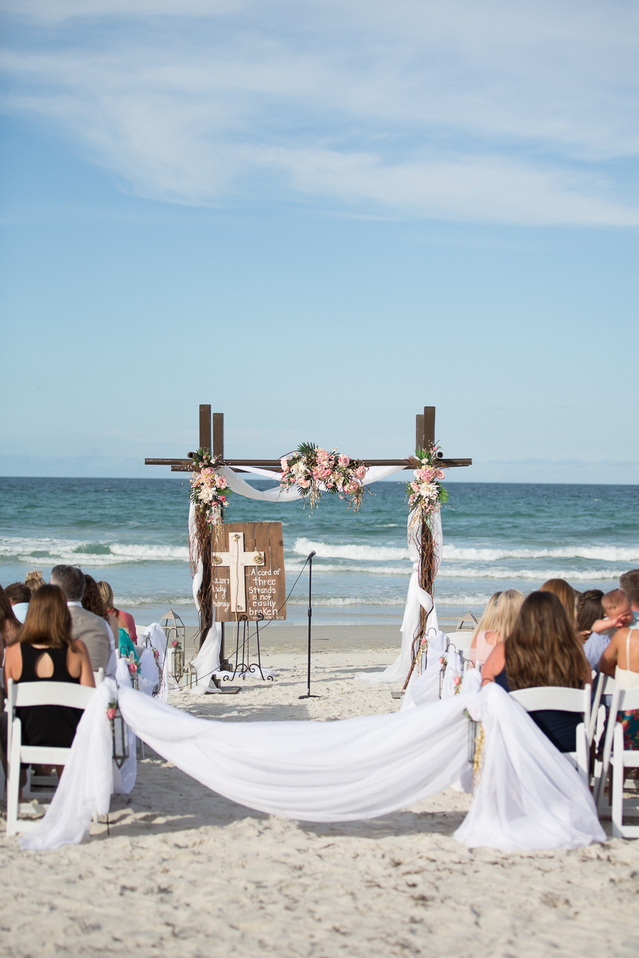 Archway with background of beach at this Daytona Beach Wedding by Destination Wedding Photographer, Amanda May Photos.