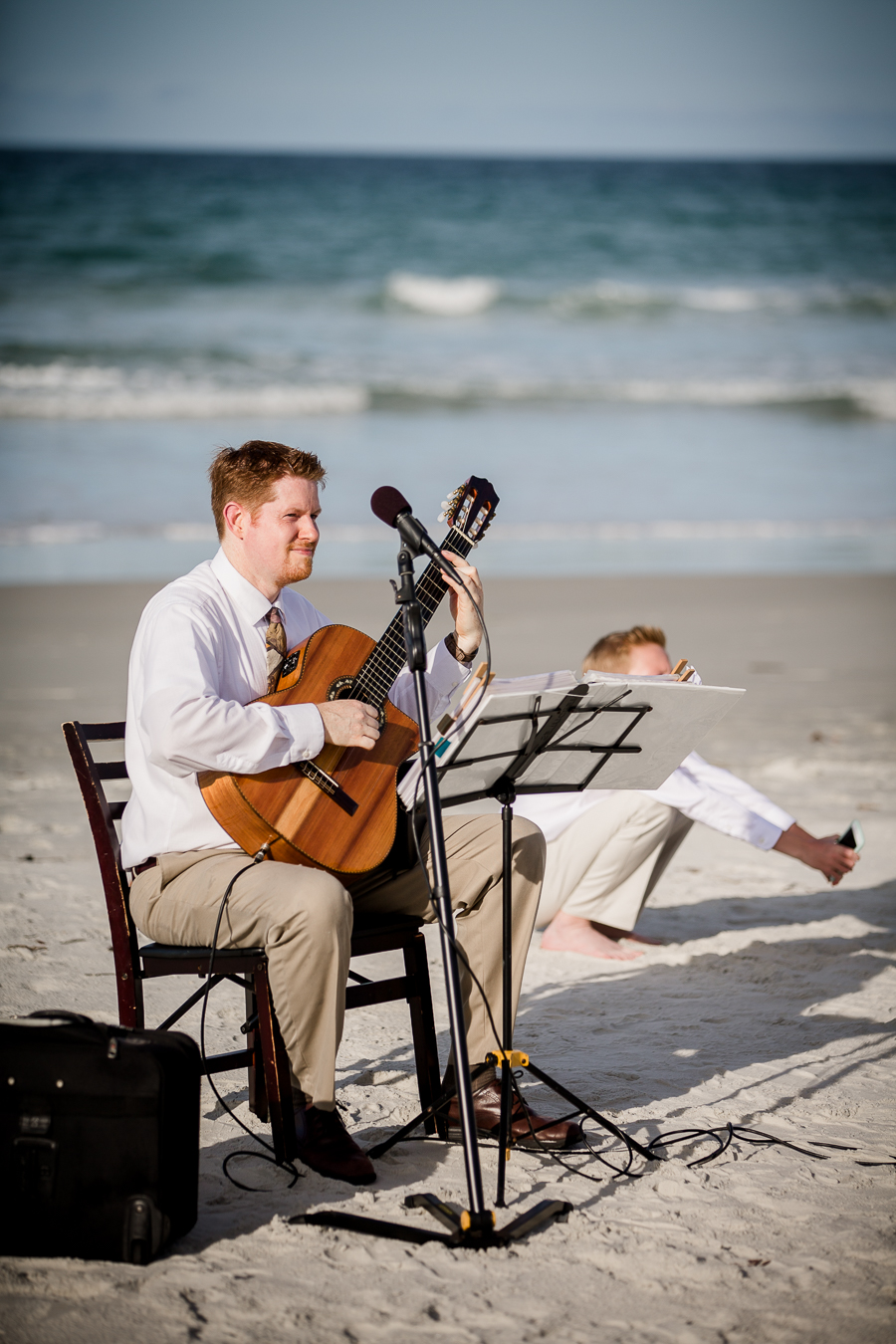 Music on the beach at this Daytona Beach Wedding by Destination Wedding Photographer, Amanda May Photos.