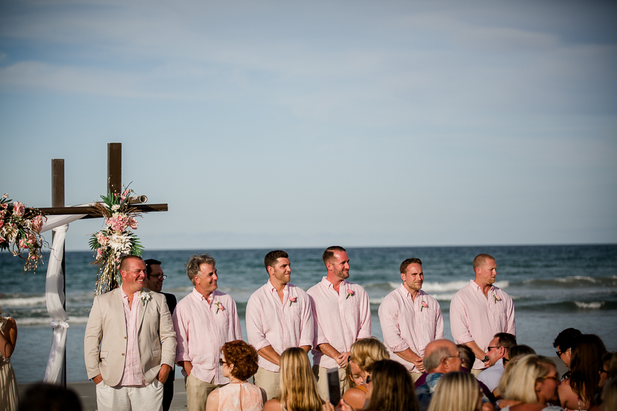 Groomsmen at the alter at this Daytona Beach Wedding by Destination Wedding Photographer, Amanda May Photos.