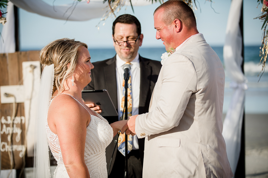 Bride and Groom looking at each other at this Daytona Beach Wedding by Destination Wedding Photographer, Amanda May Photos.