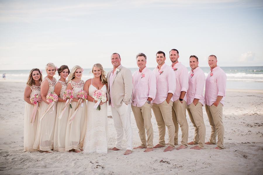 Bridal party on beach at this Daytona Beach Wedding by Destination Wedding Photographer, Amanda May Photos.