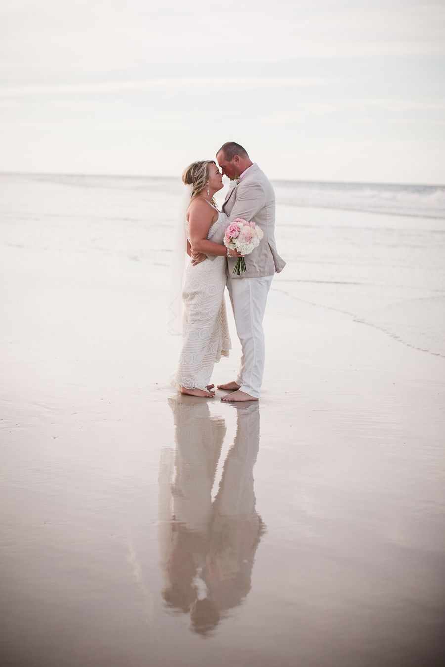 Reflection on sand at this Daytona Beach Wedding by Destination Wedding Photographer, Amanda May Photos.
