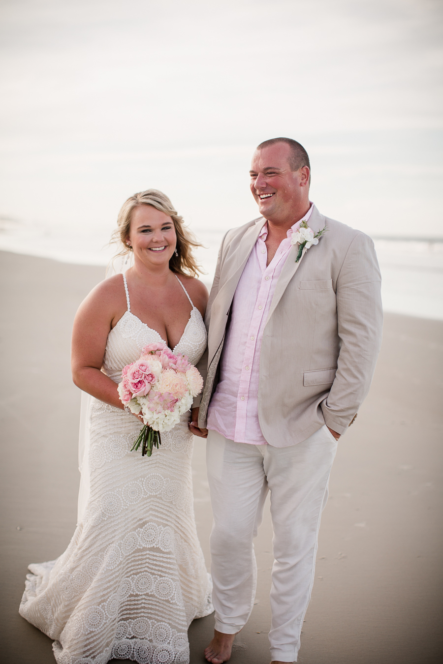 Bride and Groom at this Daytona Beach Wedding by Destination Wedding Photographer, Amanda May Photos.