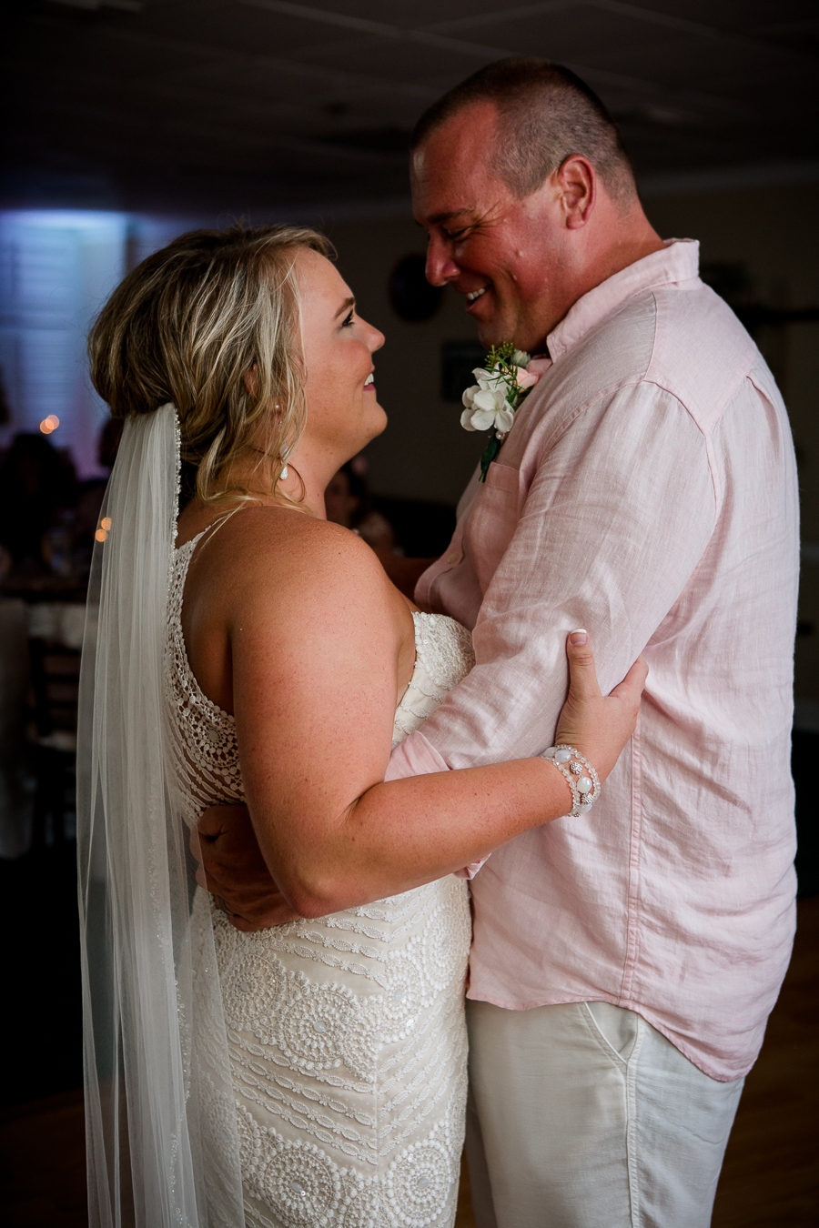 Looking at each other during dance at this Daytona Beach Wedding by Destination Wedding Photographer, Amanda May Photos.