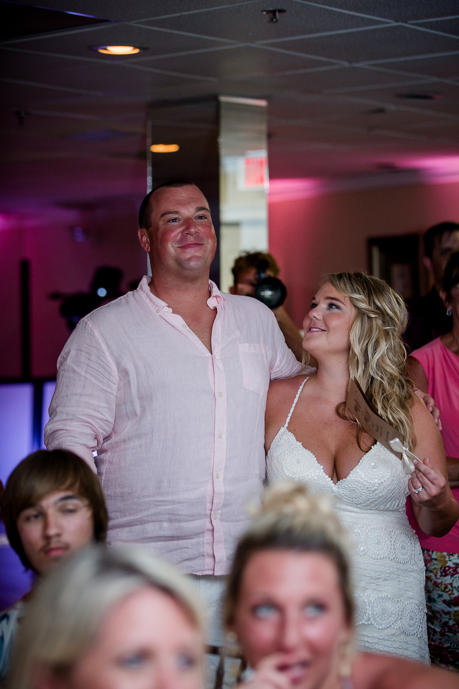 Bride looking at groom smiling at this Daytona Beach Wedding by Destination Wedding Photographer, Amanda May Photos.