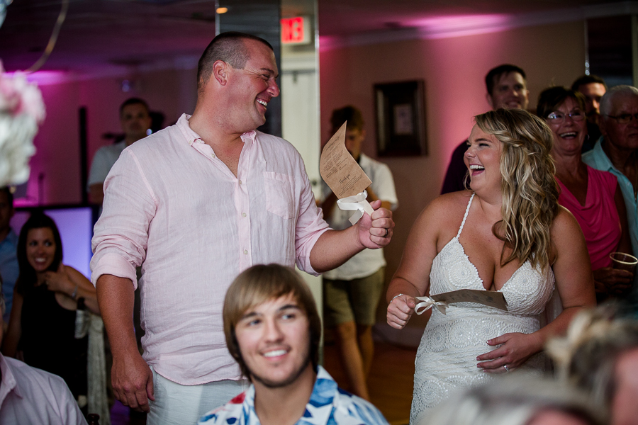 Laughing at each other at this Daytona Beach Wedding by Destination Wedding Photographer, Amanda May Photos.