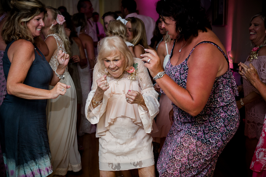Guests dancing at this Daytona Beach Wedding by Destination Wedding Photographer, Amanda May Photos.