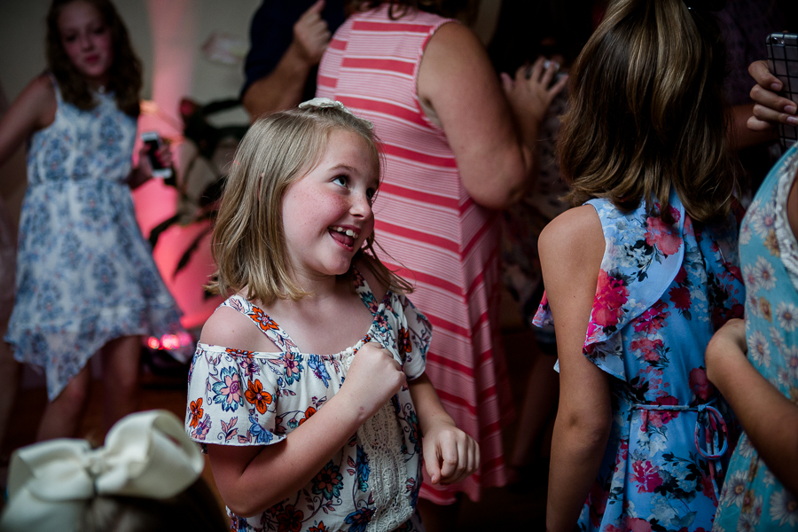 Little girls dancing at this Daytona Beach Wedding by Destination Wedding Photographer, Amanda May Photos.