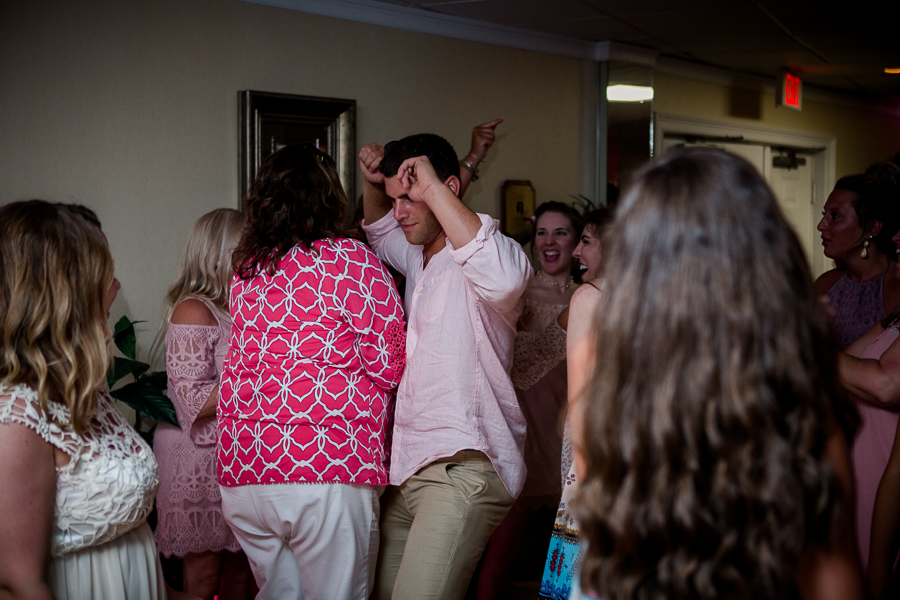Dancing and laughing at this Daytona Beach Wedding by Destination Wedding Photographer, Amanda May Photos.