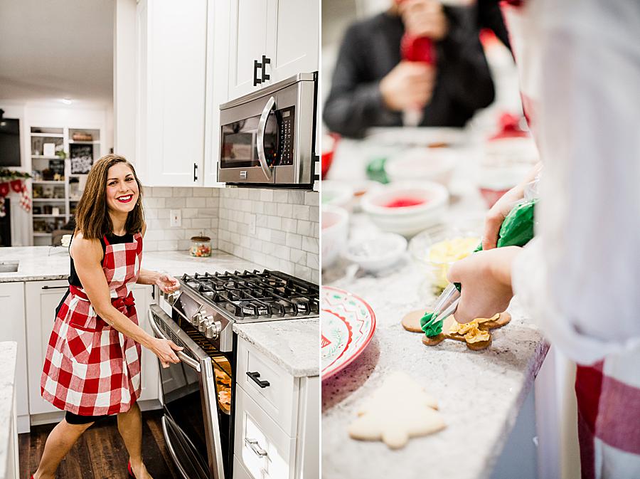Decorating cookies at this Christmas cookie session by Knoxville Wedding Photographer, Amanda May Photos.