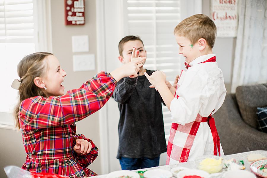 Icing fight by Knoxville Wedding Photographer, Amanda May Photos.