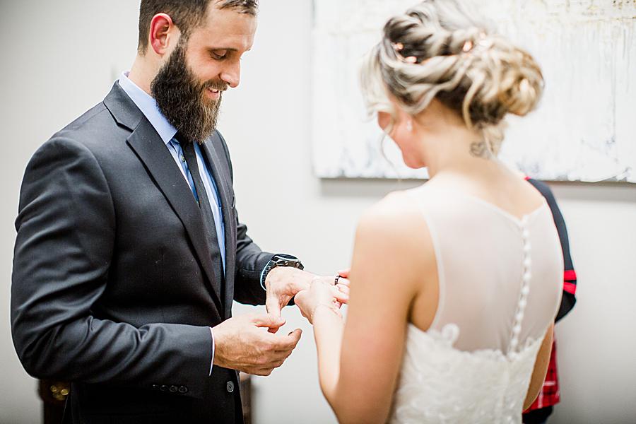 Putting on the groom's ring