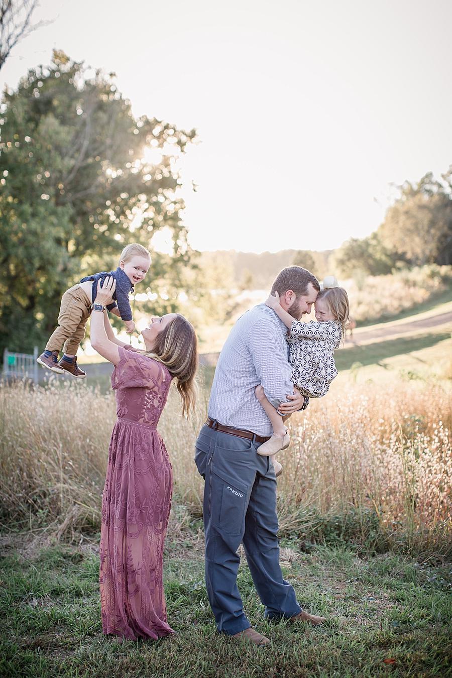 Holding the kids at this Melton Hill Park Family Session by Knoxville Wedding Photographer, Amanda May Photos.