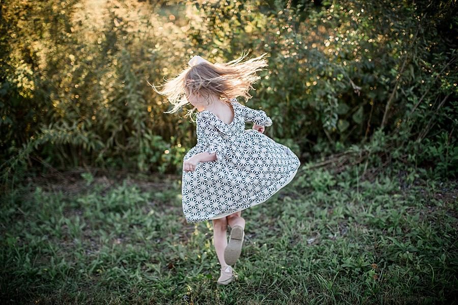 Twirling at this Melton Hill Park Family Session by Knoxville Wedding Photographer, Amanda May Photos.