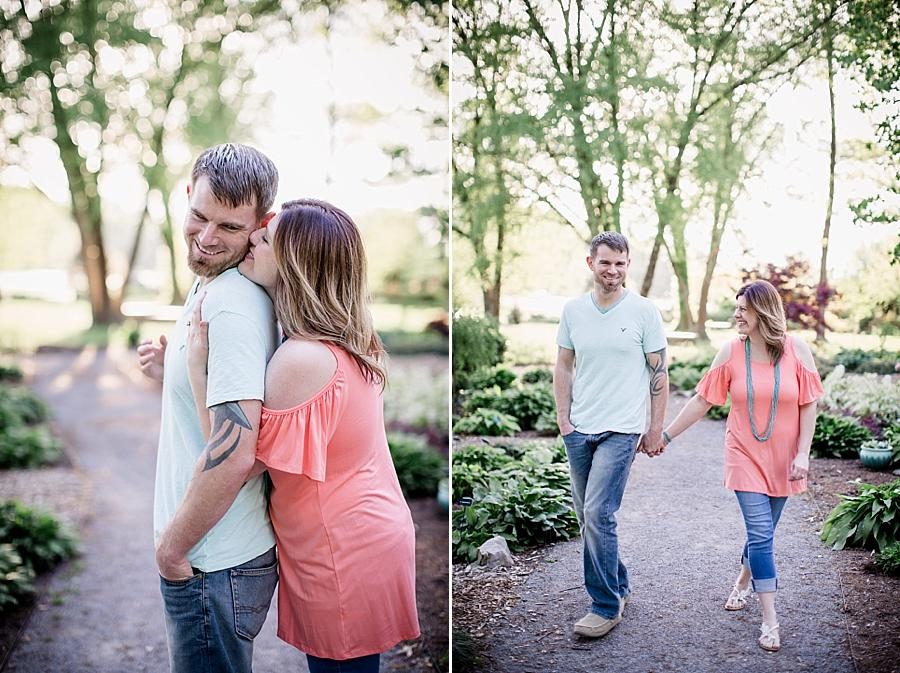Holding hands at this UT Gardens Engagement by Knoxville Wedding Photographer, Amanda May Photos.
