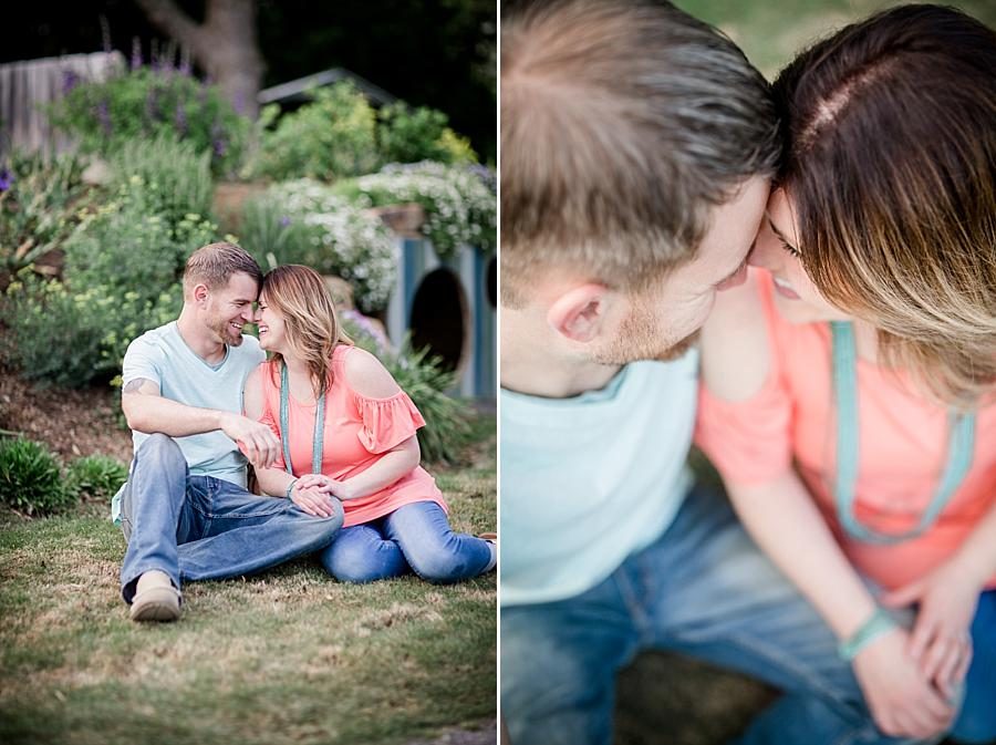 Sitting together at this UT Gardens Engagement by Knoxville Wedding Photographer, Amanda May Photos.