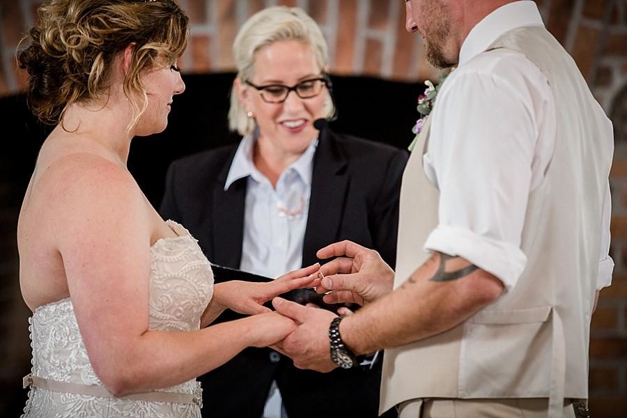 Exchanging rings at this Hunter Valley Pavilion Wedding by Knoxville Wedding Photographer, Amanda May Photos.