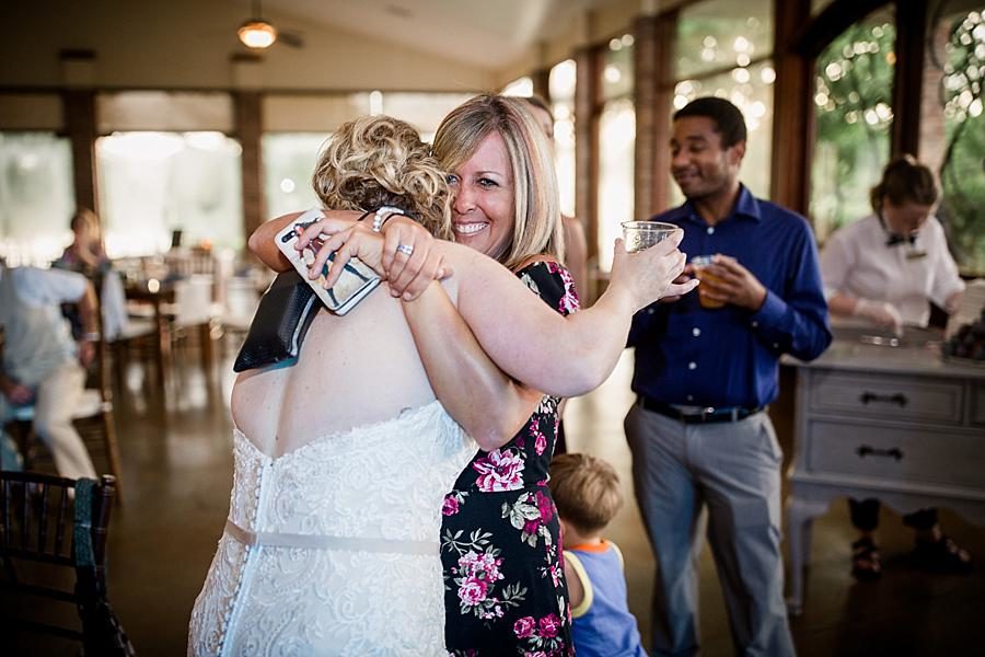Hugging the guests at this Hunter Valley Pavilion Wedding by Knoxville Wedding Photographer, Amanda May Photos.